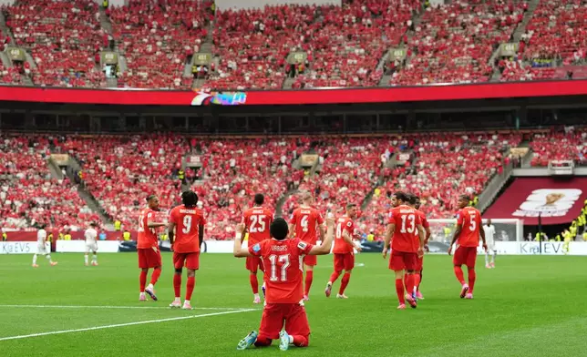 Switzerland's Ruben Vargas (17) celebrates his goal against Canada during the World Cup Group B soccer match between Switzerland and Canada in Vancouver, British Columbia, Wednesday, June 24, 2026. (Ethan Cairns/The Canadian Press via AP)