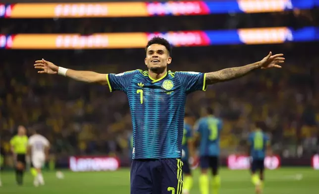 Colombia's Luis Diaz (7) celebrates after scoring their second goal during the World Cup Group K soccer match between Uzbekistan and Colombia in Mexico City, Wednesday, June 17, 2026. (AP Photo/Ashtin Barker)