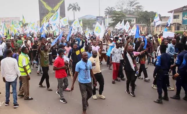 Protesters took to the streets to demonstrate against a proposed constitutional change in Kinshasa, Congo, Friday, June 12, 2026. (AP Photo/Ekutshu Yannick)