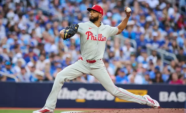 Philadelphia Phillies' Cristopher Sanchez works against the Toronto Blue Jays during second-inning baseball game action in Toronto, Monday, June 8, 2026. (Sammy Kogan/The Canadian Press via AP)