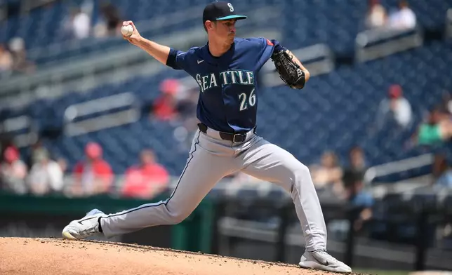 Seattle Mariners pitcher Emerson Hancock throws during the third inning of a baseball game against the Washington Nationals, Sunday, June 14, 2026, in Washington. (AP Photo/Nick Wass)