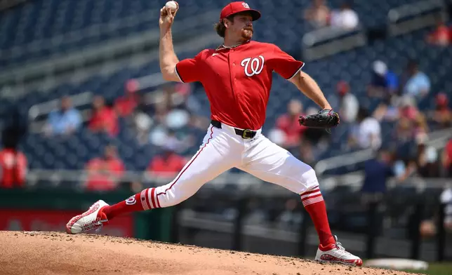 Washington Nationals pitcher Miles Mikolas throws during the third inning of a baseball game against the Seattle Mariners, Sunday, June 14, 2026, in Washington. (AP Photo/Nick Wass)