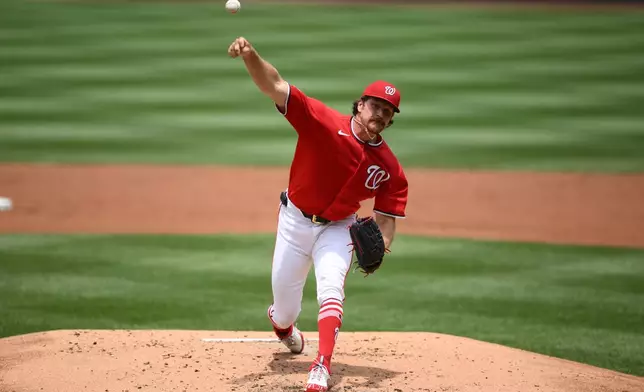 Washington Nationals pitcher Miles Mikolas throws during the second inning of a baseball game against the Seattle Mariners, Sunday, June 14, 2026, in Washington. (AP Photo/Nick Wass)