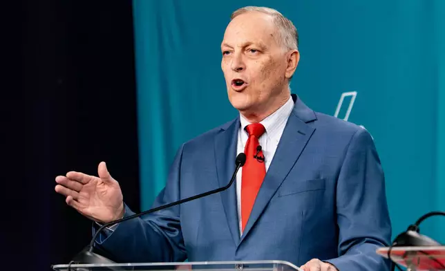 Rep. Andy Biggs, R-Ariz., debates with his Republican opponents in the 2026 AZ Clean Elections governor primary debate, Wednesday, June 17, 2026, in Scottsdale, Ariz. (Diannie Chavez/The Arizona Republic via AP, Pool)