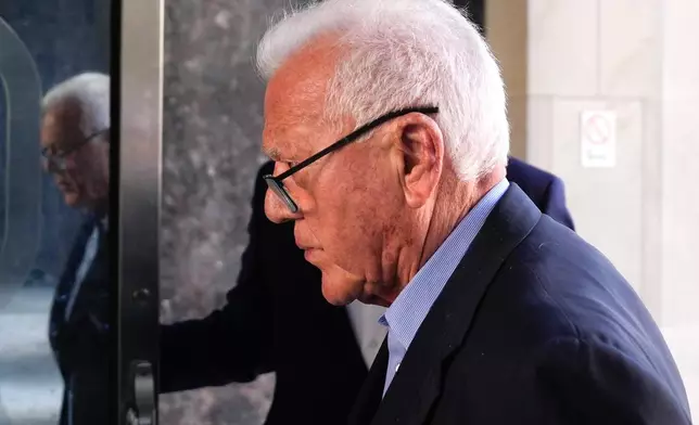 Frank Stronach arrives at a Toronto court on Friday, June 19, 2026. (Chris Young /The Canadian Press via AP)