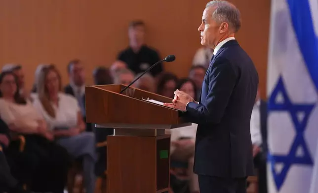 Canadian Prime Minister Mark Carney delivers remarks at Holy Blossom Temple in Toronto on Monday, June 1 2026. (Chris Young/The Canadian Press via AP)