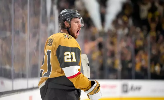 Vegas Golden Knights center Brett Howden celebrates his goal during the second period in Game 4 of the NHL hockey Stanley Cup Final series against the Carolina Hurricanes, Tuesday, June 9, 2026, in Las Vegas. (AP Photo/John Locher)