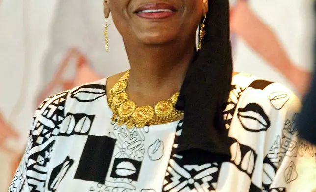 FILE - Khadijah Farrakhan, wife of Nation of Islam leader Louis Farrakhan, stands before members of the 20th Navajo Nation Council Wednesday, July 19, 2006 in Window Rock, Ariz. (AP Photo/Matt York, File)