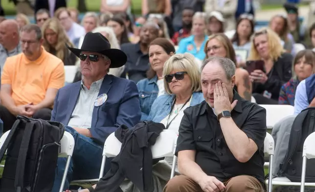 Aaron Neville, father of 14-year-old Alexander Neville, who died from fentanyl poisoning after being deceived by a drug dealer operating on Snapchat, wipes tears from his eyes during a Social Media Victims Remembrance Day memorial on Capitol Hill, Tuesday, June 23, 2026, in Washington. (AP Photo/Rod Lamkey, Jr.)
