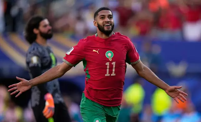 Morocco's Ismael Saibari celebrates scoring his side's opening goal against Brazil during the World Cup Group C soccer match in East Rutherford, N.J., near New York, Saturday, June 13, 2026. (AP Photo/Frank Franklin II)