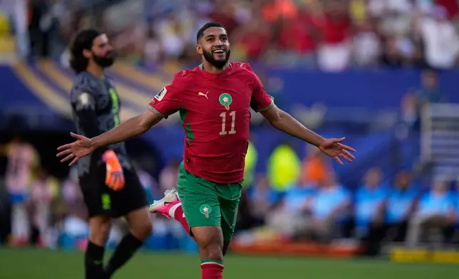 Morocco's Ismael Saibari celebrates scoring his side's opening goal against Brazil during the World Cup Group C soccer match in East Rutherford, N.J., near New York, Saturday, June 13, 2026. (AP Photo/Frank Franklin II)