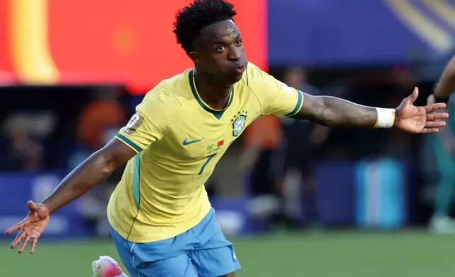 Brazil's Vinicius Junior (7) celebrates a goal iduring the World Cup Group C soccer match between Brazil and Morocco in East Rutherford, N.J., near New York, Saturday, June 13, 2026. (AP Photo/Adam Hunger)