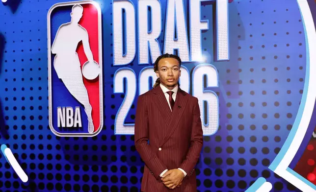 Kingston Flemings arrives for the first round of the NBA basketball draft Tuesday, June 23, 2026, in New York. (AP Photo/Adam Hunger)