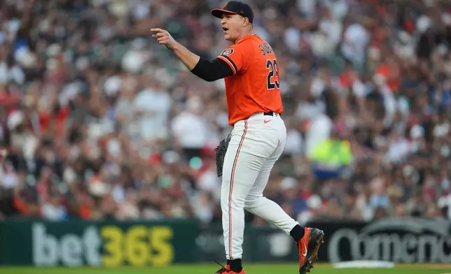 Detroit Tigers pitcher Tarik Skubal (29) reacts towards the Chicago White Sox dugout during the fifth inning of a baseball game Friday, June 19, 2026, in Detroit. (AP Photo/Paul Sancya)