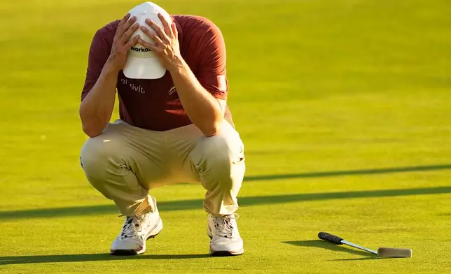 Matthew Fitzpatrick, of England, reacts after missing a putt on the 16th hole during the third round of the U.S. Open golf tournament at Shinnecock Hills Golf Club in Southampton, N.Y., Saturday, June 20, 2026. (AP Photo/Gerald Herbert)