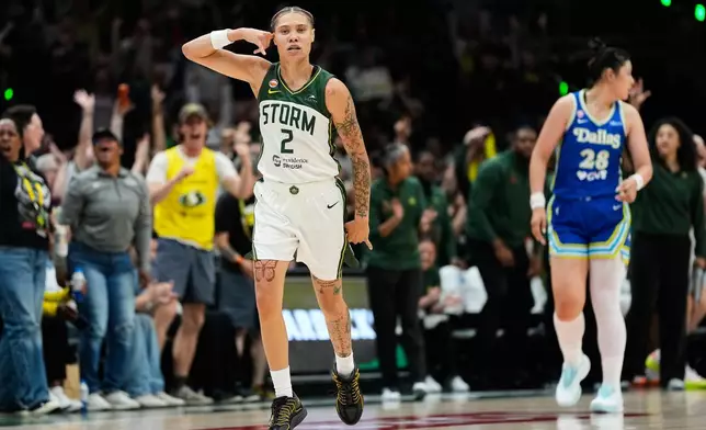 Seattle Storm guard Natisha Hiedeman (2) reacts after a basket against the Dallas Wings during the second half of a WNBA basketball game, Monday, June 22, 2026, in Seattle. (AP Photo/Lindsey Wasson)