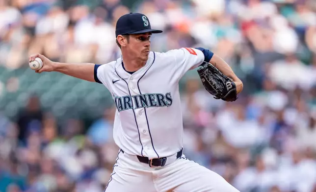 Seattle Mariners starter Emerson Hancock delivers a pitch during the first inning of a baseball game against the New York Mets, Monday, June 1, 2026, in Seattle. (AP Photo/Stephen Brashear)