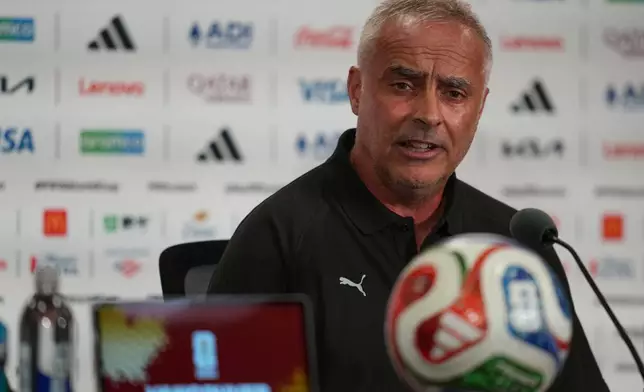 New Zealand head coach Darren Bazeley listens to a question during a press conference on the eve of the team's World Cup soccer match against Egypt, Saturday, June 20, 2026 in Vancouver, British Columbia. (AP Photo/Abbie Parr)