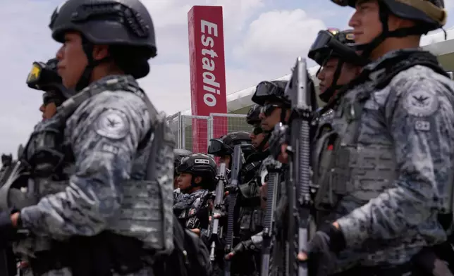 National Guard deploy outside the stadium that will host FIFA World Cup matches in Guadalajara, Mexico, Tuesday, June 9, 2026. (AP Photo/Matias Delacroix)