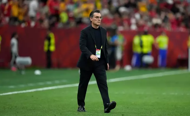 Turkey head coach Vincenzo Montella walks off the field at the end of first half group D World Cup soccer action against Australia in Vancouver, British Columbia, Saturday, June 13, 2026. (Darryl Dyck/The Canadian Press via AP)