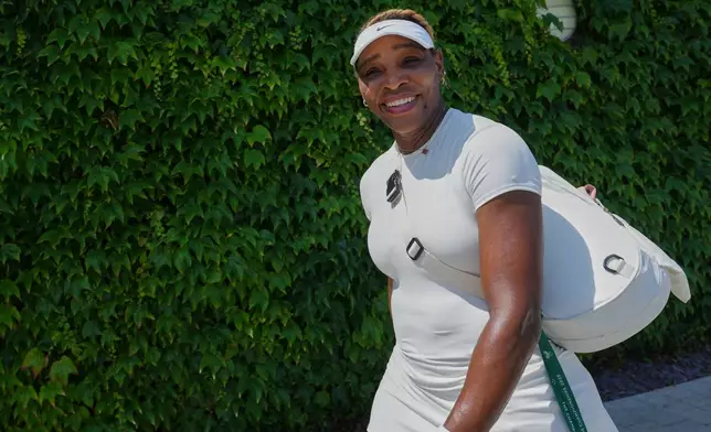 Serena Williams of the United States smiles after a training session at the All England Lawn Tennis and Croquet Club, ahead of the Wimbledon Championships in London, Thursday, June 25, 2026. (AP Photo/Kirsty Wigglesworth)