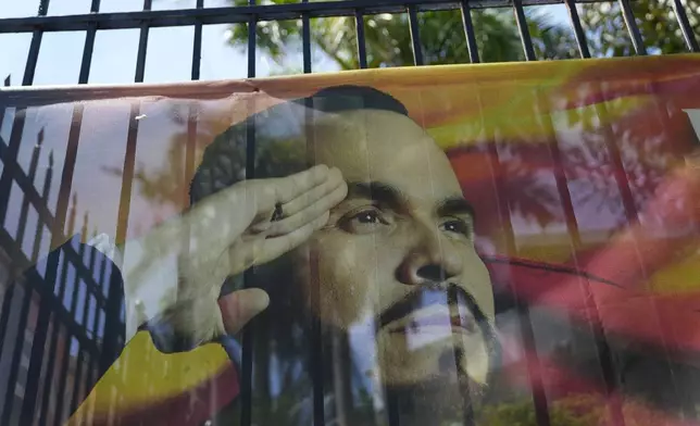 A campaign banner of presidential candidate Abelardo de la Espriella hangs outside his party's headquarters in Barranquilla, Colombia, Monday, June 22, 2026, the day after the presidential election runoff. (AP Photo/Rodrigo Abd)