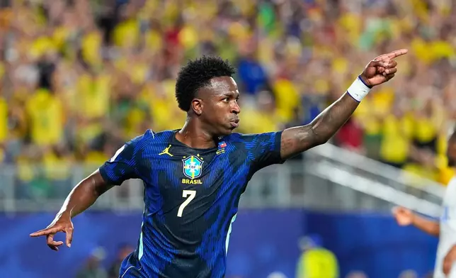 Brazil's Vinicius Junior (7) celebrates after scoring his side's third goal during the World Cup Group C soccer match between Brazil and Haiti in Philadelphia, Friday, June 19, 2026. (AP Photo/Petr David Josek)