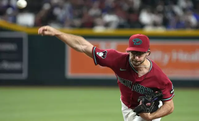 Arizona Diamondbacks pitcher Zac Gallen throws against the Los Angeles Dodgers in the first inning of a baseball game, Wednesday, June 3, 2026, in Phoenix. (AP Photo/Rick Scuteri)