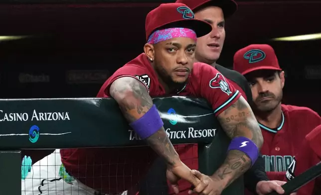 Arizona Diamondbacks' Ketel Marte watches game action from the dugout against the Los Angeles Dodgers in the fifth inning of a baseball game, Wednesday, June 3, 2026, in Phoenix. (AP Photo/Rick Scuteri)
