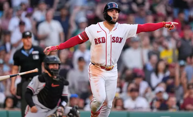 Boston Red Sox's Wilyer Abreu watches the flight of his two-run home run during the third inning of a baseball game against the Baltimore Orioles, Wednesday, June 3, 2026, in Boston. (AP Photo/Charles Krupa)