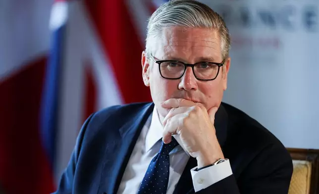 Britain's Prime Minister Keir Starmer speaks to the members of the media on the sidelines of the G7 summit, in Thonon-les-Bains, France, Wednesday, June 17, 2026. (Isabel Infantes/Pool Photo via AP)