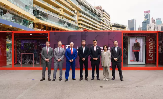 Football legend Sir David Beckham (centre), The Hong Kong Jockey Club’s Chief Executive Officer Winfried Engelbrecht-Bresges (3rd left), Executive Director, Racing, Andrew Harding (2nd left) and Executive Director, Sports Business, Casper Stylsvig (1st left), Ken Wong, Executive Vice President of Lenovo, President of Lenovo’s Solutions &amp; Services Group (3rd right), Serena Cheung, General Manager, Lenovo Hong Kong and Macau (2nd right), and Tom Cheng, General Manager of Lenovo’s Solutions and Services Group (HK) (1st right), unveil the Lenovo Experience Booth while attending the “Racing with Football” series at Happy Valley Racecourse.