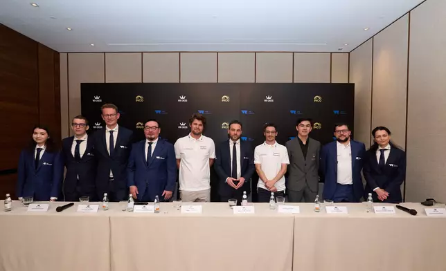 (From left) Alexandra Goryachkina, Jan-Krzysztof Duda, Jan Gustafsson, H.E. Mr Zandanshatar Gombojav, Magnus Carlsen, Wadim Rosenstein, Fabiano Caruana, special guest Javokhir Sindarov, Maxime Vachier-Lagrave, and Alexandra Kosteniuk during the WR Chess' team press conference in Hong Kong, 16 June 2026.