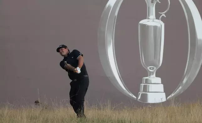 Patrick Reed of the United States chips onto the 18th green during the first day of the British Open Golf championships at Royal Birkdale golf club, in Southport, England, Thursday, July 16, 2026. (AP Photo/Peter Morrison)