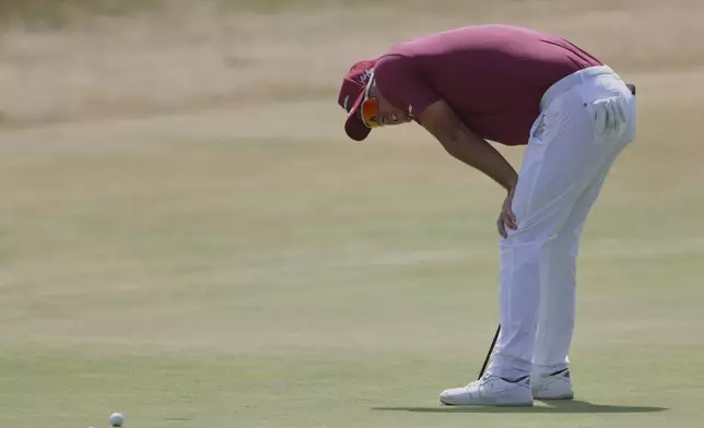 Lucas Herbert of Australia reacts after missing a par putt on the 18th green during the second day of the British Open Golf championships at Royal Birkdale golf club, in Southport, England, Friday, July 17, 2026. (AP Photo/Peter Morrison)