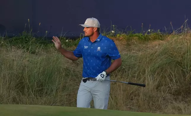 Bryson DeChambeau of the United States reacts after playing a shot on the 17th green during the second day of the British Open Golf championships at Royal Birkdale golf club, in Southport, England, Friday, July 17, 2026. (AP Photo/Jon Super)