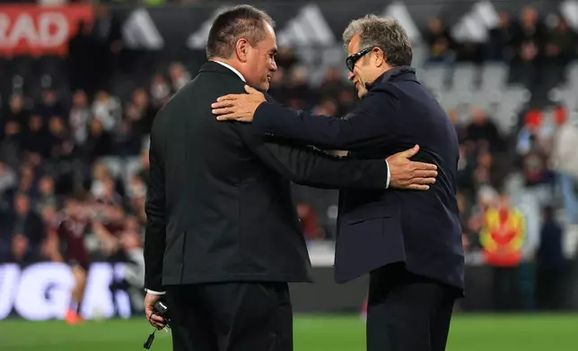 New Zealand head coach Dave Rennie, left, and France head coach Fabien Galthié talk ahead of the Nations Championship rugby international between the All Blacks and France in Christchurch New Zealand, Saturday, July 4, 2026. (Craig Butland/Photosport via AP)