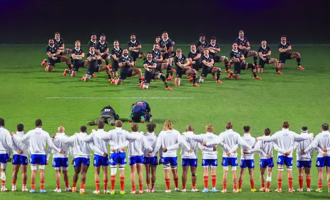 New Zealand perform the haka, as the French team watches ahead of the Nations Championship rugby international between the All Blacks and France in Christchurch New Zealand, Saturday, July 4, 2026. (Craig Butland/Photosport via AP)