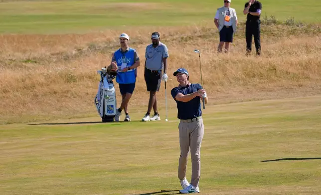 Marcus Plunkett of the United States plays a shot on the 11th fairway during a practice round for the British Open Golf championships at Royal Birkdale golf club, in Southport, England, Tuesday, July 14, 2026. (AP Photo/David Goldman)