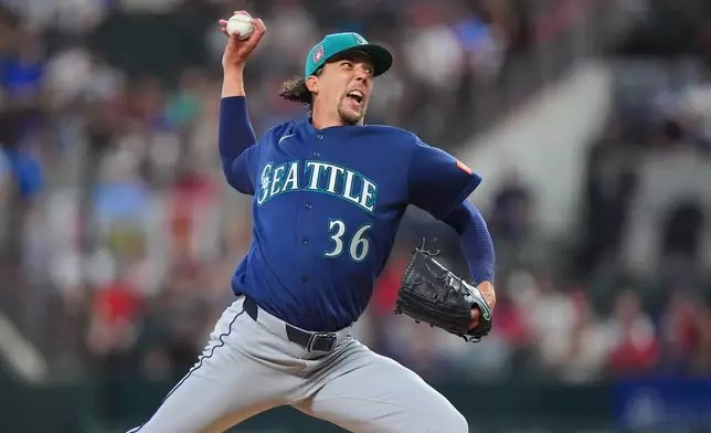 Seattle Mariners starting pitcher Logan Gilbert throws during the first inning of a baseball game against the Texas Rangers, Sunday, July 26, 2026, in Arlington, Texas. (AP Photo/LM Otero)