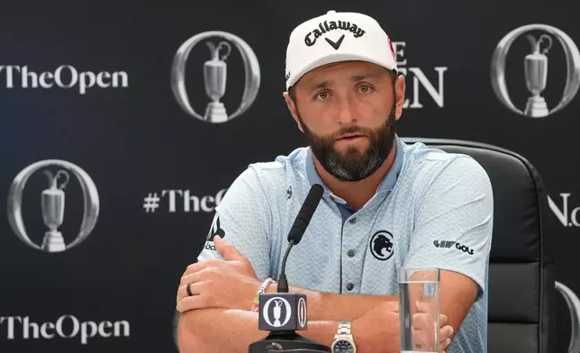 Jon Rahm of Spain speaks at a press conference ahead of the British Open Golf championships at Royal Birkdale golf club, in Southport, England, Tuesday, July 14, 2026. (AP Photo/Jon Super)