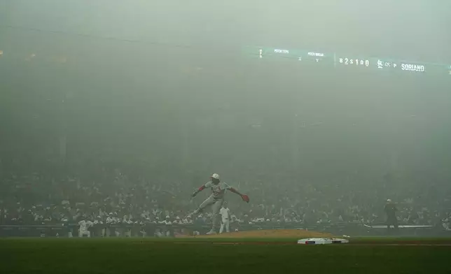 St. Louis Cardinals pitcher Kyle Leahy throws the ball in the fog against the Chicago Cubs during the sixth inning of a baseball game Saturday, July 4, 2026, in Chicago. (AP Photo/David Banks)