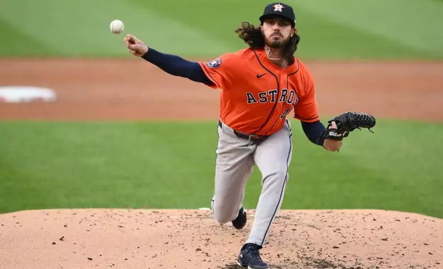 Houston Astros pitcher Spencer Arrighetti throws during the second inning of a baseball game against the Washington Nationals, Wednesday, July 8, 2026, in Washington. (AP Photo/Nick Wass)