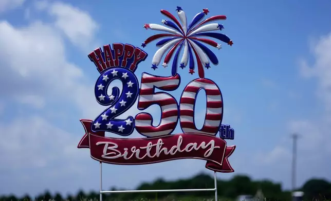 A "Happy 250th Birthday" signs seen near the entrance at Lucky Patriot Fireworks in Batavia, Ohio, Tuesday, June 30, 2026. (AP Photo/Carolyn Kaster)