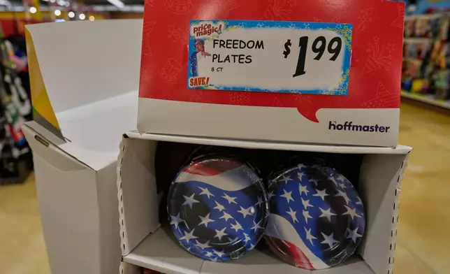 American Flag themed freedom plates are for sale at Jungle Jim's International Market Eastgate in Cincinnati, Tuesday, June 30, 2026. (AP Photo/Carolyn Kaster)