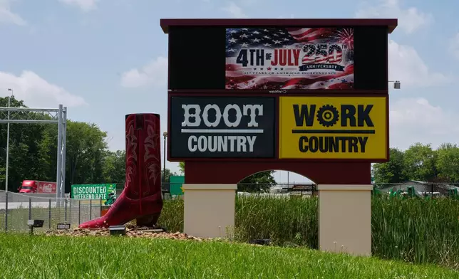Boot Country Work Country's electric sign reads "4th of July 250th Anniversary" in Batavia, Ohio, Tuesday, June 30, 2026. (AP Photo/Carolyn Kaster)
