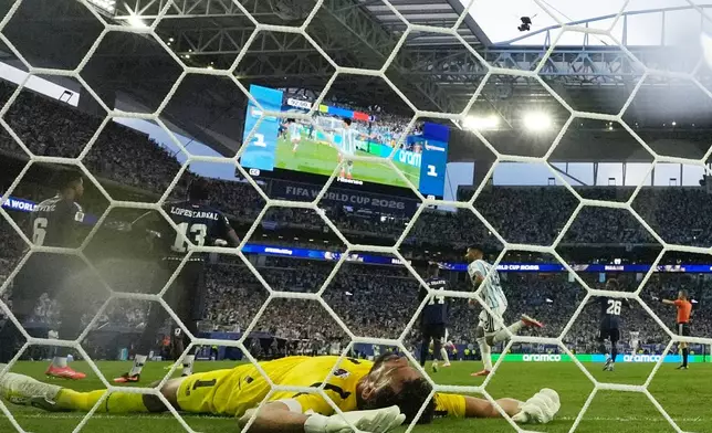 Cape Verde goalkeeper Vozinha (1) reacts after Argentina's Lisandro Martinez scored a goal during the World Cup round of 32 soccer match between Argentina and Cape Verde in Miami Gardens, Fla., Friday, July 3, 2026. (AP Photo/Lynne Sladky)