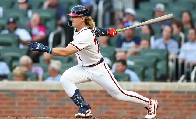 Atlanta Braves' Jim Jarvis hits a single in the second inning of a baseball game against the San Diego Padres, Wednesday, July 22, 2026, in Atlanta. (AP Photo/Colin Hubbard)