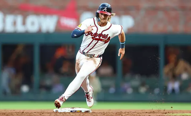Atlanta Braves' Jim Jarvis rounds second base in the second inning of a baseball game against the San Diego Padres, Wednesday, July 22, 2026, in Atlanta. (AP Photo/Colin Hubbard)