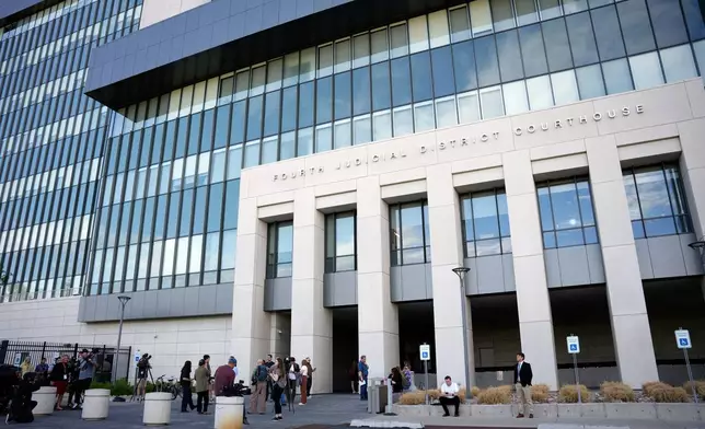 Media reporters wait outside the Fourth District Courthouse, ahead of a hearing for Tyler Robinson, accused in the fatal shooting of Charlie Kirk, Monday, July 6, 2026, in Provo, Utah. (AP Photo/Marielle Scott)